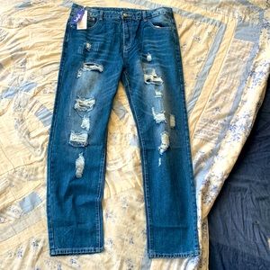 it’s blue cutout jeans that i never wore and it’s very stylish and stands out.